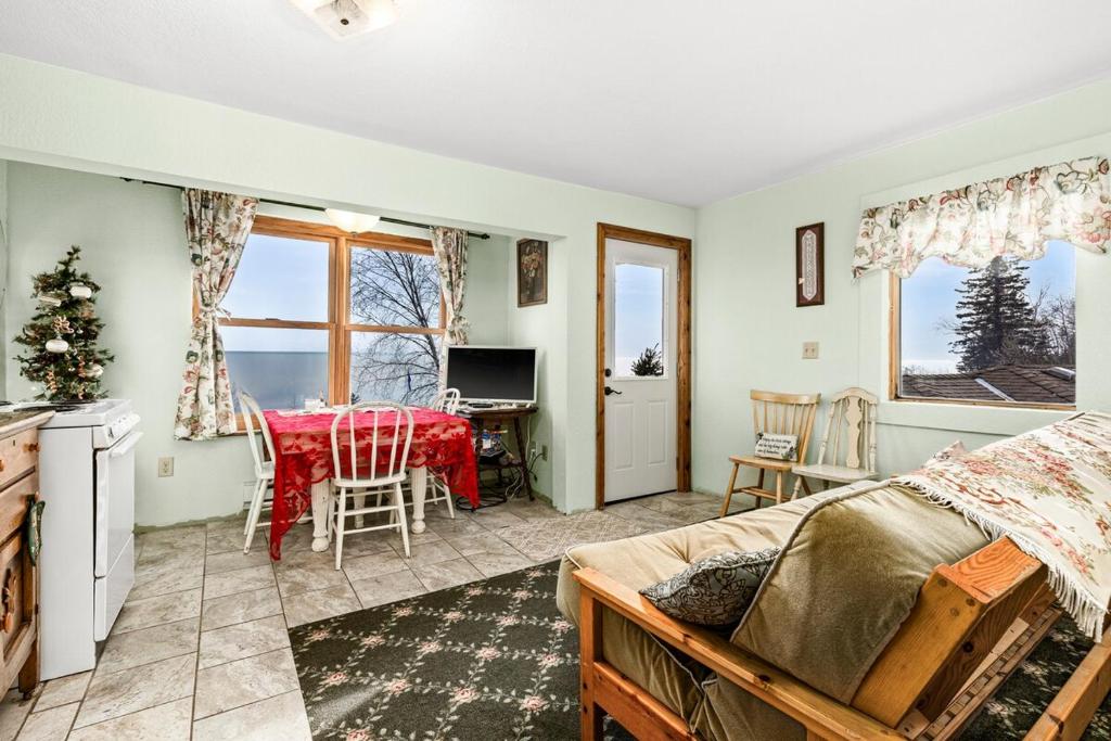 Balcony view from the Anderson Deluxe Suite at The Inn On Gitche Gumee overlooking Lake Superior and the shoreline.